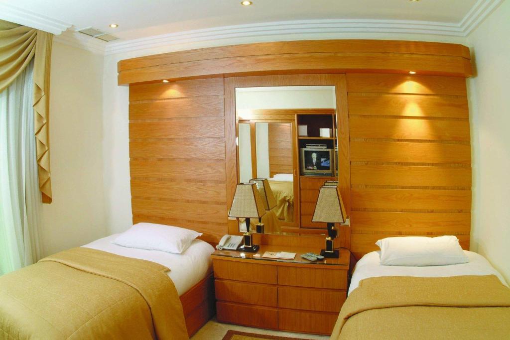 Mirage Suites Kuwait City Rom bilde